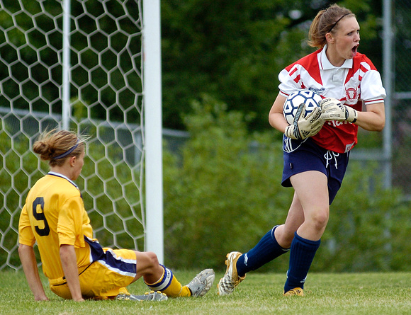 Don Campbell / H-P staff
Mattawan's goalkeep Amanda Klage saves a shot from St. Joseph's Brittany Damschroder (9) during the second half of the Division 2 District game Thursday, May 31, 2007, at Upto