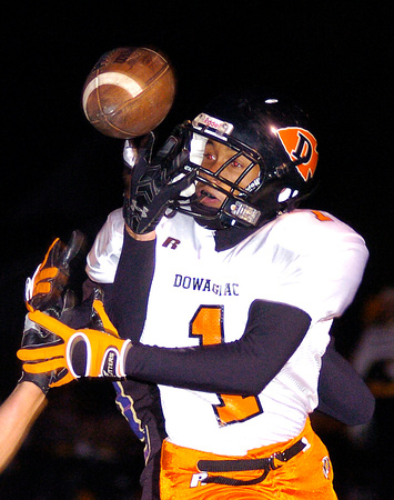 Don Campbell / H-P staff
Dowagiac's Kevin Mitchell (1) misses a pass by inches while defended by South Haven's Royce Kuenzli (23) during the first half Saturday, October 27, 2007, at South Haven High