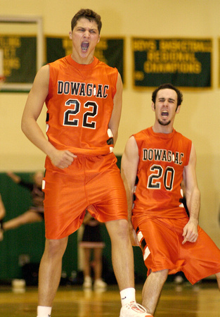 Don Campbell / H-P staff
Dowagiac's Jeff Cooper (22) and Dustin Shaffer (20) celebrate as they reduce Lakeshore's lead to two, during the final minutes of Friday night's game at Coloma High School.