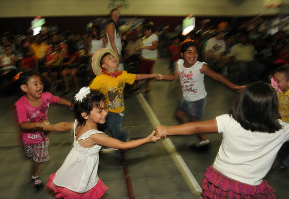 Don Campbell / H-P staff
Children dance during a Fiesta Campo de Suenos, presented by the Eau Claire Summer Migrant Program, Wednesday, July 27, 2011, at the Eau Claire Public School Student Acitivity