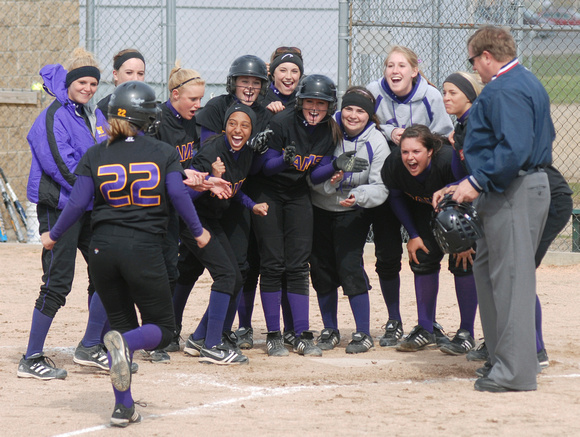 Don Campbell / H-P staff
South Haven's Meghan Hojara (22) celebrates a homerun with teammates during the second inning of the first game of a doubleheader against Dowagiac Thursday, April 21, 2011, at