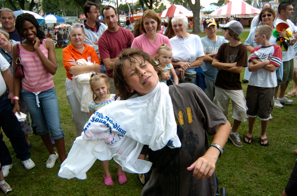Don Campbell / H-P staff
Austin Wroblewski, 12, from St. Joseph, races to put on a frozen shirt during a frozen t-shirt contest, sponsored by The Herald-Palladium Thursday, August 16, 2007, at the Ber