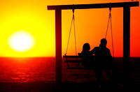 Don Campbell / H-P staff
A couple enjoy a fall sunset, Saturday night near Lions Park Beach in St. Joseph.