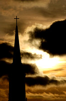 Don Campbell / H-P staff
The sun rises over the St. Joseph Catholic Church Monday, December 18, 2006, near downtown St. Joseph.