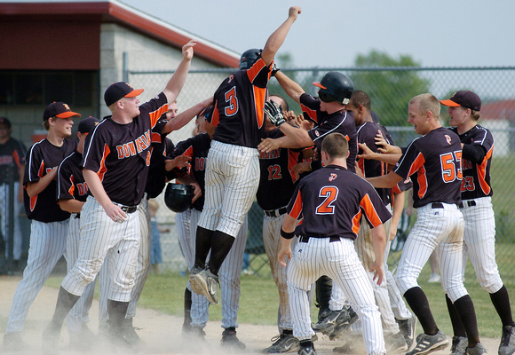 Don Campbell / H-P staff
Dowagiac's Tim Bartee (3) celebrates a three run homer against Lakeshore during the third inning Saturday, June 2, 2007, at Lakeshore High School.