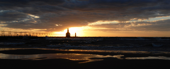 The sun sets on the St. Joseph Lighthouse September 7, 2010.