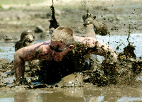 Don Campbell / H-P staff
Jeff Calderwood, from St. Joseph, gets a little dirty Saturday, July 29, 2006, as 23 teams with over 200 players showed up for a mud volleyball tournament at Whirlpool Field i