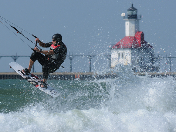 Don Campbell / H-P staff
Roland Schmidt, from Holland, works the waves off Silver Beach on his kiteboard Tuesday, September 13, 2011.