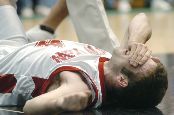 Don Campbell / H-P staff
Paw Paw's Kiel Reidenbach cries out in pain after going down hard in the first quarter of Tuesday night's game against Wyoming Park at Grand Valley State.