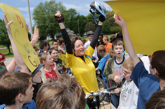 Don Campbell / H-P staff
Children's author Sue Stauffacher celebrates with Coloma Middle School students after arriving at Coloma High School Tuesday, May 17, 2011. Stauffacher is biking the 250 miles