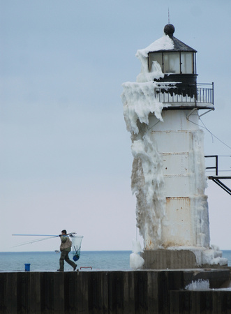 Don Campbell / H-P staff
Snow and ice coat the St. Joseph North Pier Outer Light Friday, December 25, 2009.