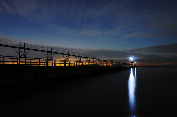 Star trails are photographed over the St. Joseph Lighthouse.