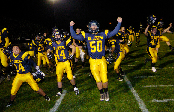Don Campbell / H-P Staff
From left, Ryan Vitale (24) Palmer Averill (44) and Michael Siemans (50) celebrate the Bears overtime win against Wayland Friday, October 31, 2008, at St. Joseph High School.