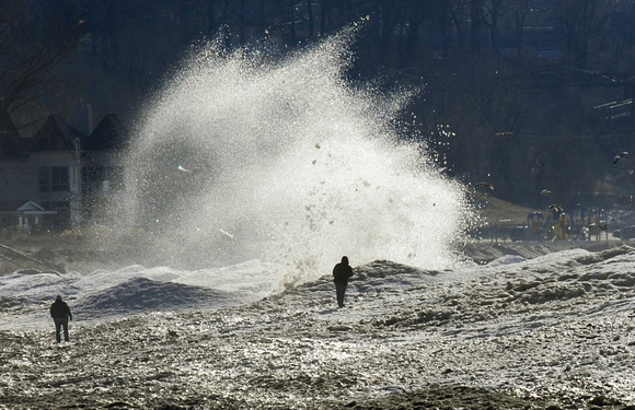 Don Campbell / H-P Staff
Waves crash through the ice along Silver Beach Friday, January 2, 2009.