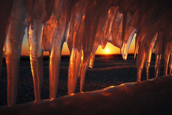 Don Campbell / H-P staff
The sun sets on icicles along the North Pier recently in St. Joseph.