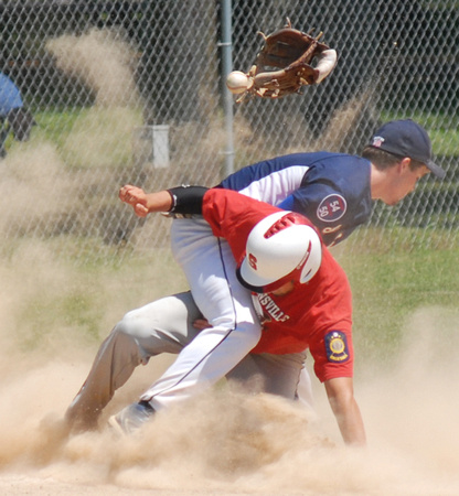 Don Campbell / H-P staff
Stevensville Post 568's Ben Bournay collides with St. Joseph Post 163's Conner Magro at third during the fourth inning of a Legion district game Saturday, July 17, 2010, at Ri
