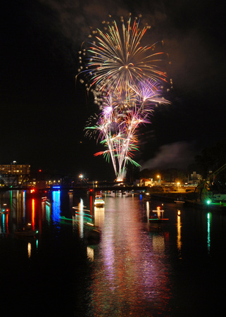 Fireworks are reflected in the St. Joseph River during the 2010 Venetian Festival Saturday, July 17, 2010.