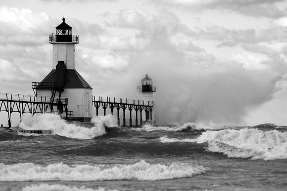 Waves crash into the St. Joseph Lighthouse October 14, 2011.
